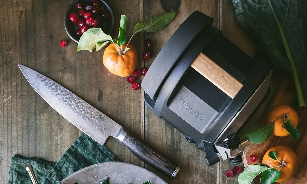 Picture of a knife and a knife sharpening machine for christmas