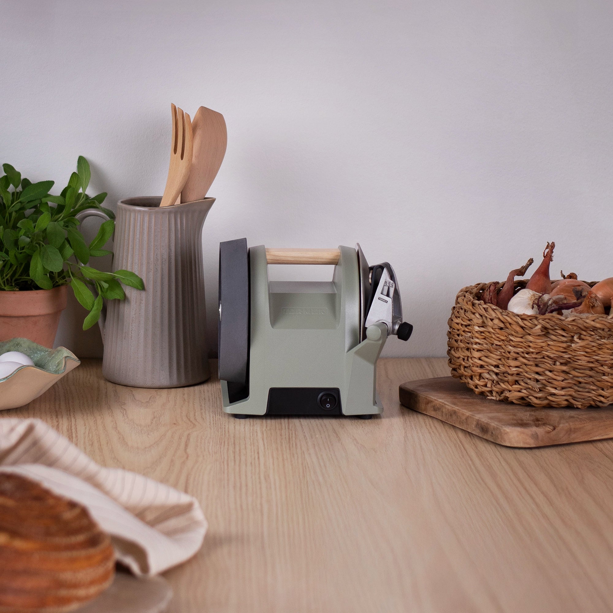 Tormek T-1 in Ash Green on kitchen counter with decoration
