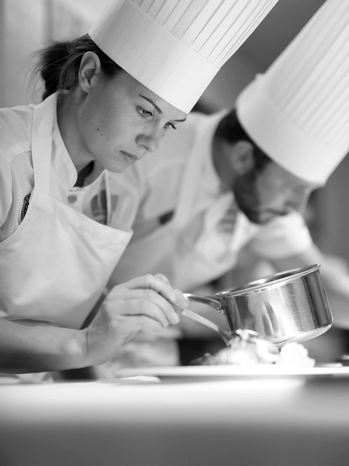 Members of the Swedish Culinary Team are plating a dish